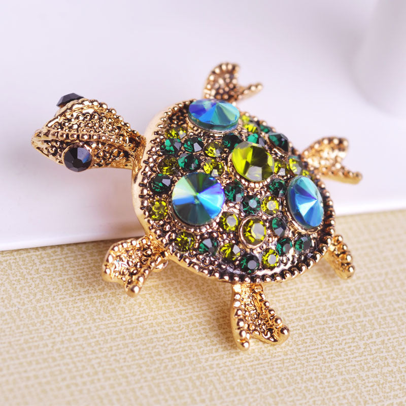 Jolie broche tortue en crystal